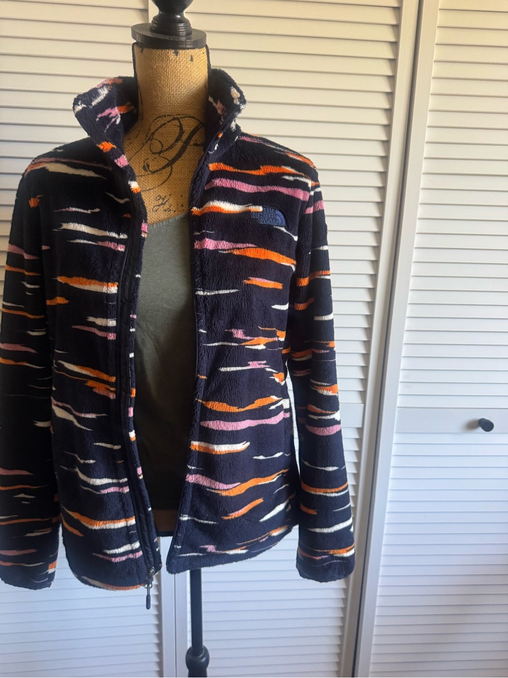 The North Face Black Fleece Jacket with Orange, Pink & White Stripes